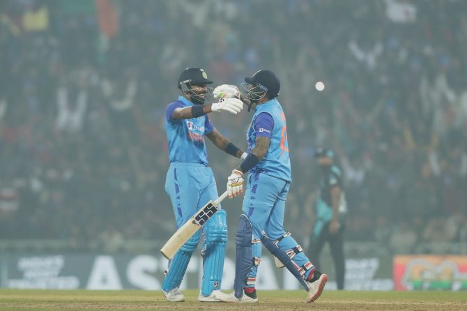 Hardik Pandya and Suryakumar Yadav celebrate after taking India over the line in the second T20 International against New Zealand, in Lucknow, on Sunday.