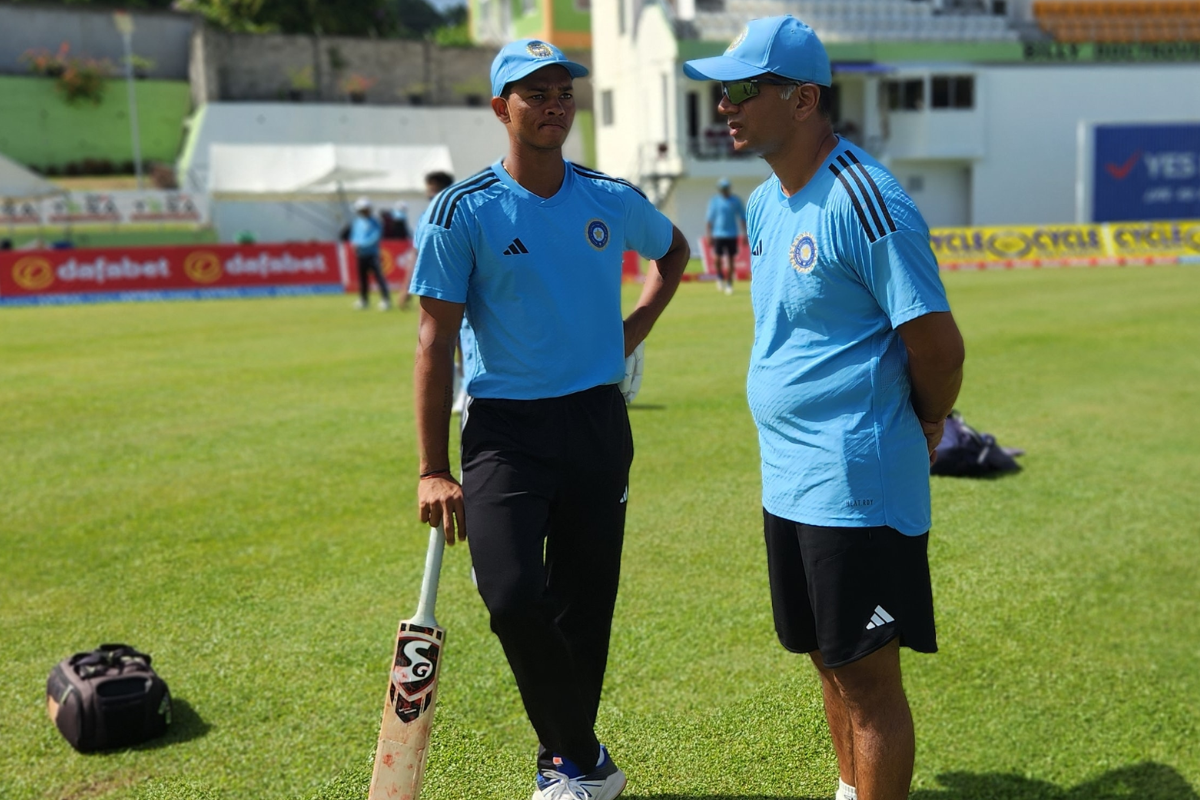 Yashaswi Jaiswal speaks with Head Coach Rahul Dravid during a practice session.