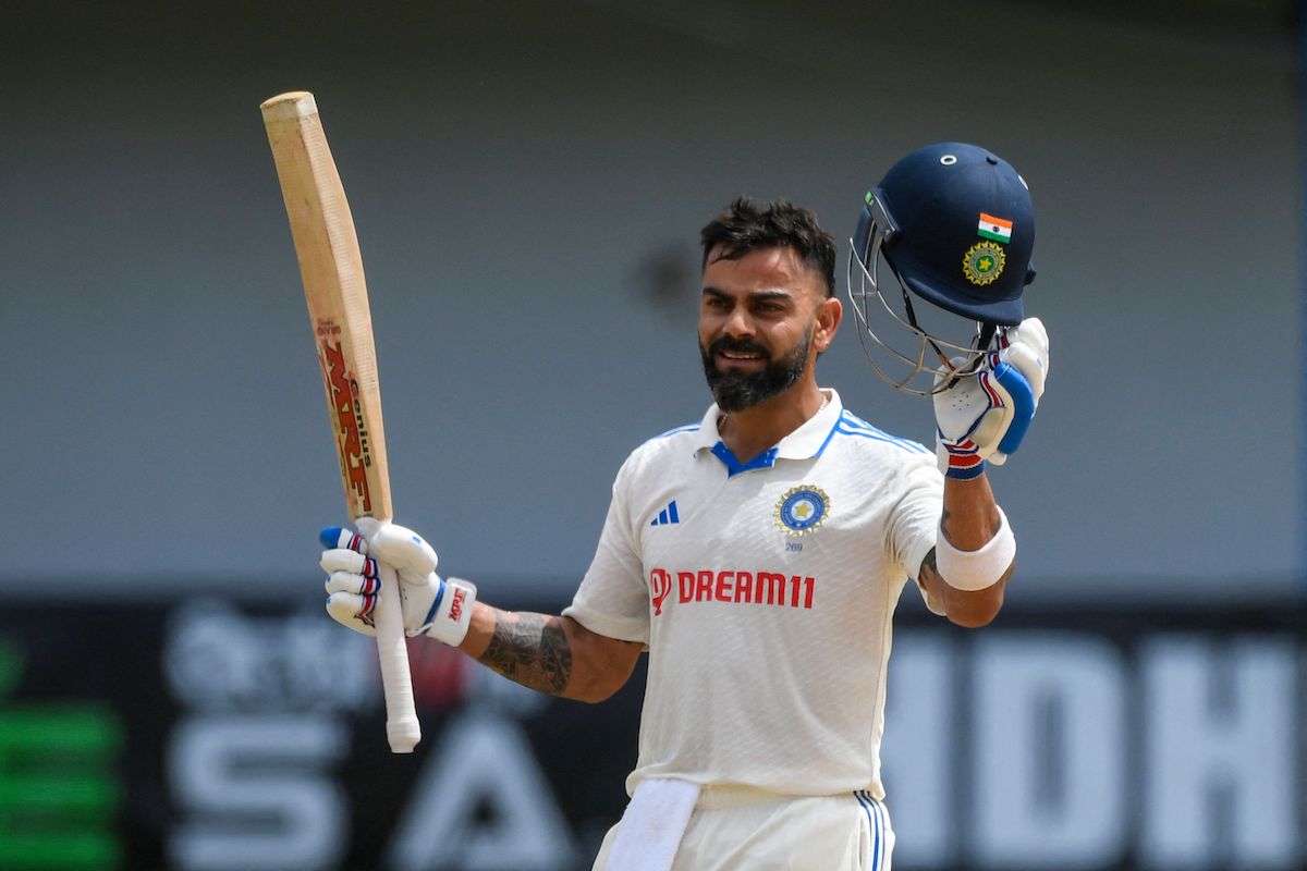 Virat Kohli celebrates after registering his 29th Test hundred during Day 2 of the second Test against the West Indies at Ports of Spain on Friday