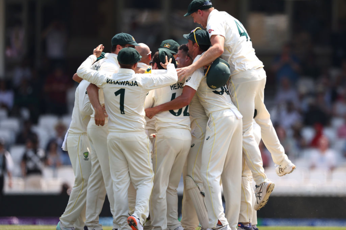 Australia players celebrate the wicket of Mohammed Siraj to dismiss India for 234 and win the WTC final by 209 runs 