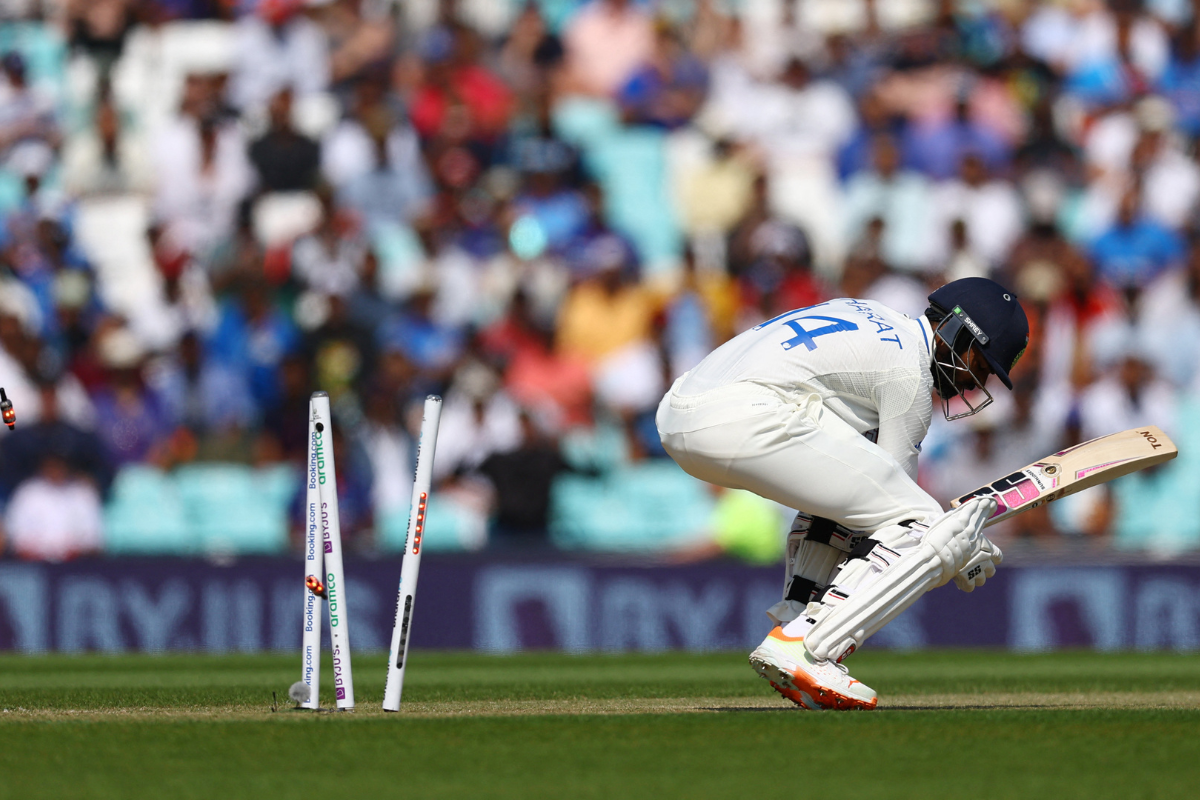 India's Srikar Bharat is bowled out by Australia's Scott Boland