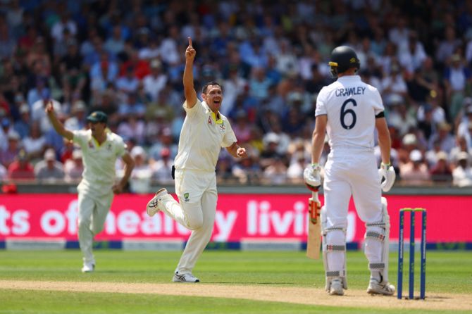Australia's Scott Boland celebrates after taking the wicket of England's Zak Crawley 