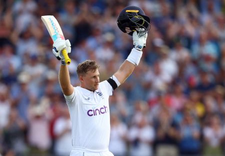 Joe Root celebrates his 34th century