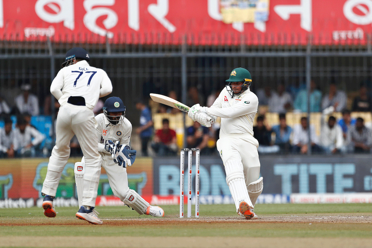 Australia's Usman Khawaja plays a shot en route his half-century on Day 1 of the 3rd Test in Indore on  Wednesday.