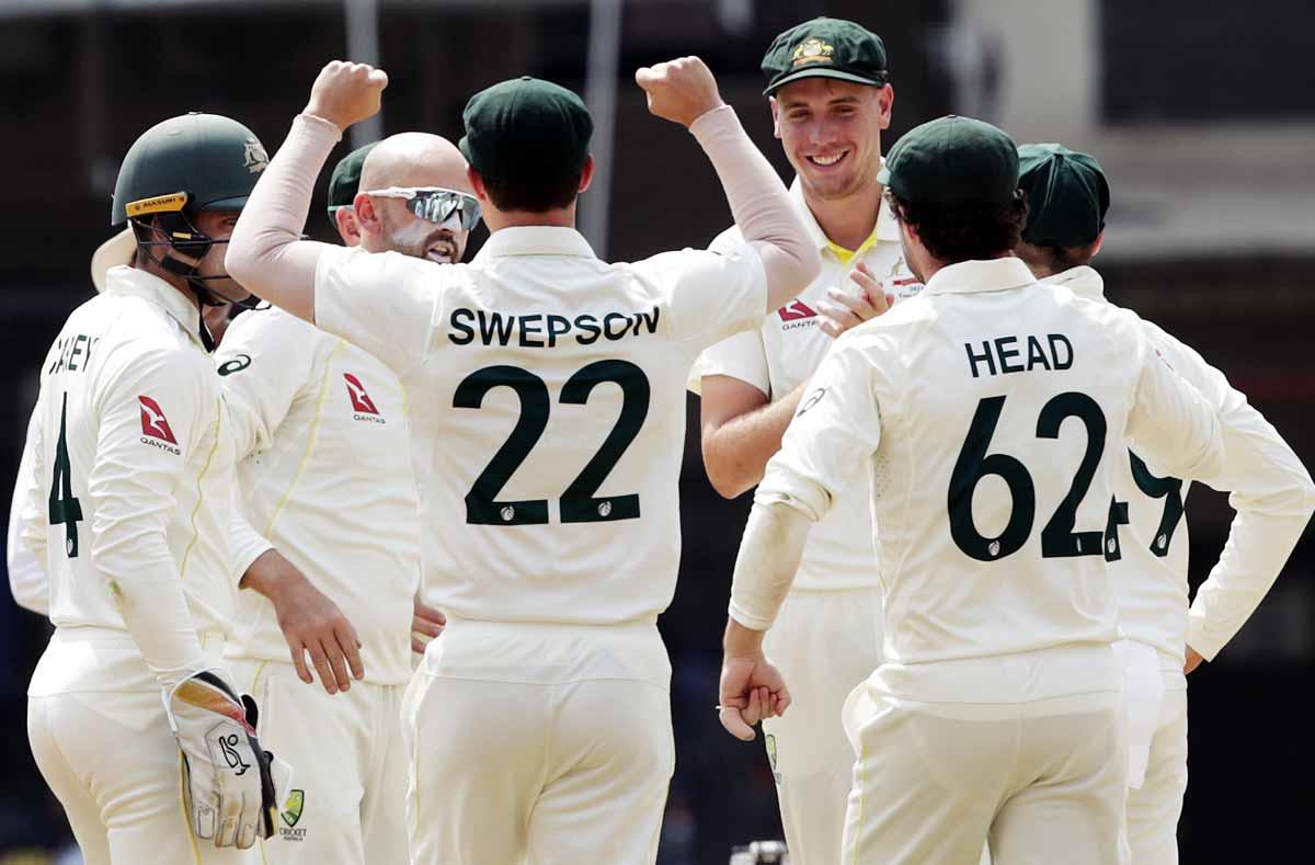 Nathan Lyon celebrates the wicket of Shubman Gill.