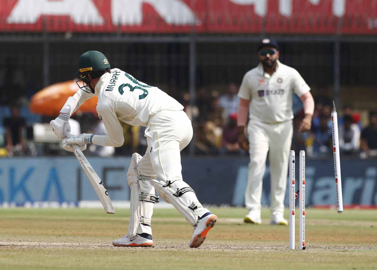 Todd Murphy is bowled by Umesh Yadav.