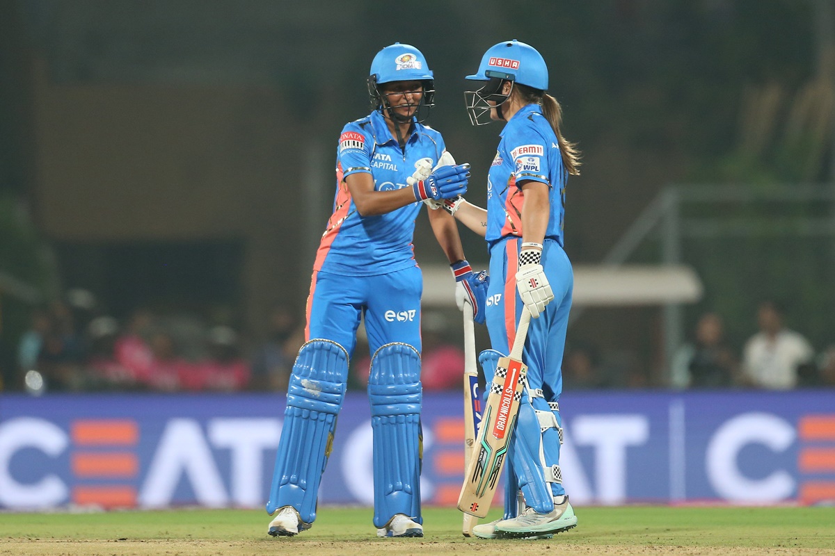 Harmanpreet Kaur's 65-run onslaught and her 89-run stand for the fourth wicket with Amelia Kerr powered Mumbai Indians to a massive total of 207/5 against Gujarat Giants in the Women's Premier League match on Saturday.