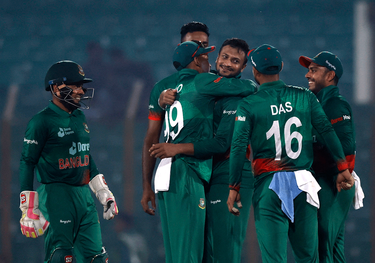 Bangladesh's Shakib Al Hasan celebrates with teammates after taking the wicket of England's Rehan Ahmed during the third ODI at ZAC Stadium in Chattogram, Bangladesh, on Monday.