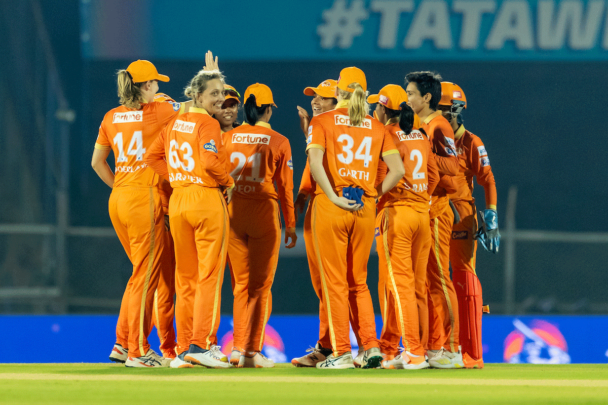 Gujarat Giants' Ashleigh Gardner celebrates the wicket of MI's Hayley Matthews