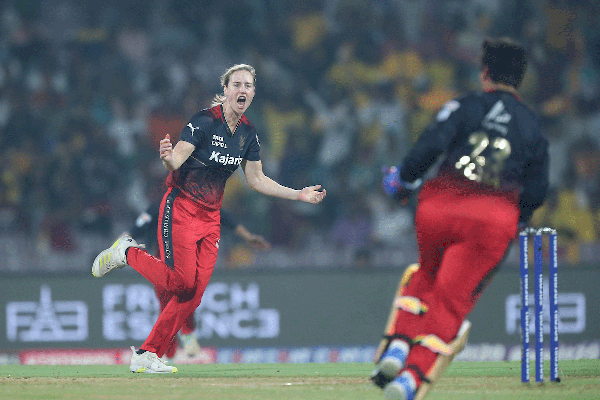 Royal Challengers Bangalore's Ellyse Perry celebrates the wicket of UP Warriorz's Grace Harris
