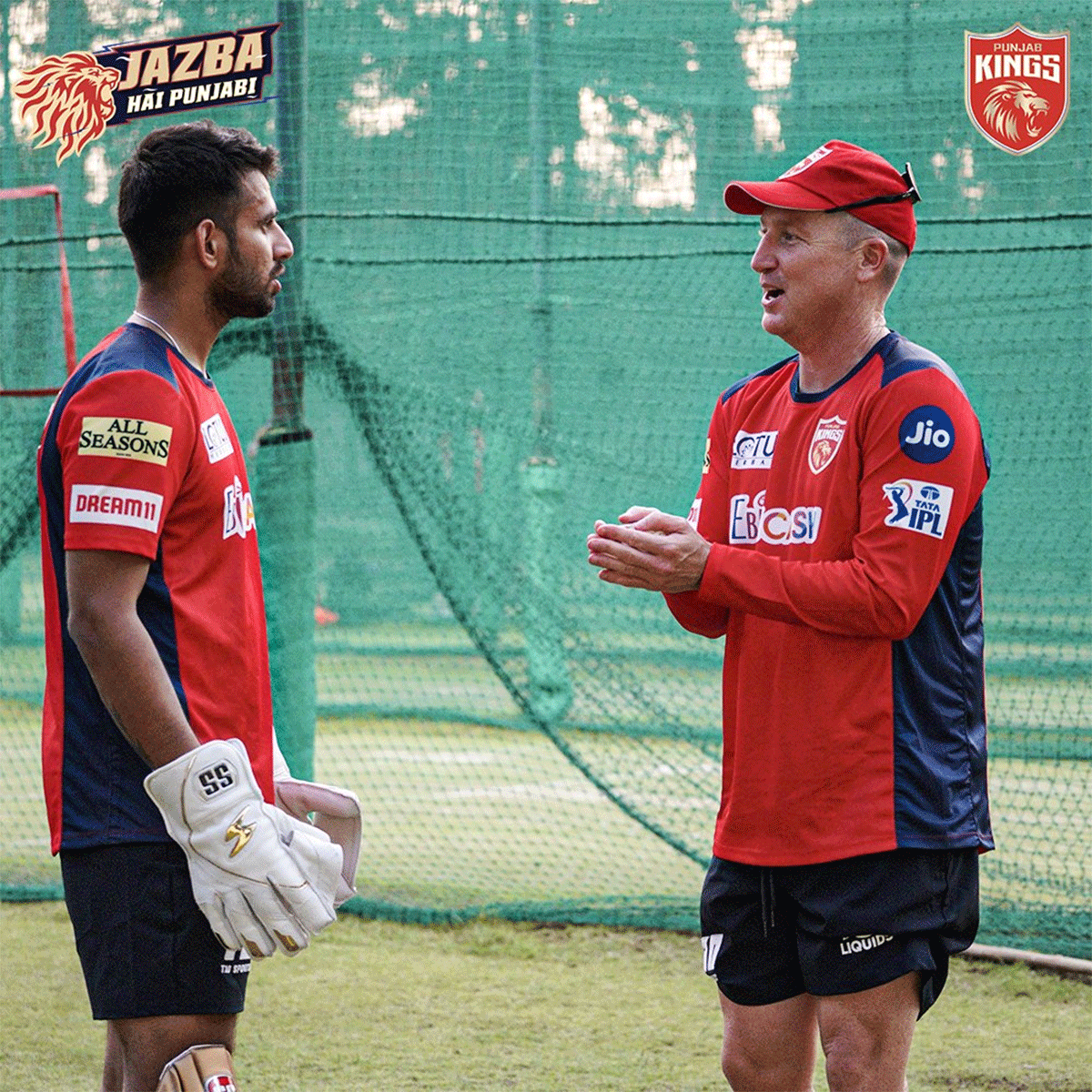 Punjab Kings' assistant coach Brad Haddin with Jitesh Sharma in training