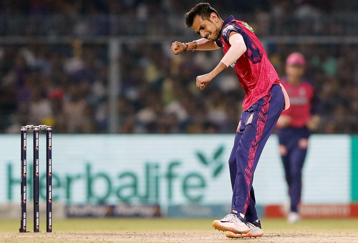 Yuzvendrda Chahal celebrates after taking the wicket of Venkatesh Iyer.