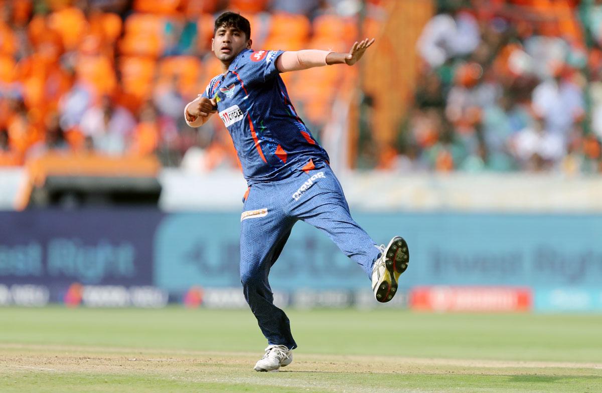 Yash Thakur celebrates the wicket of Rahul Tripathi