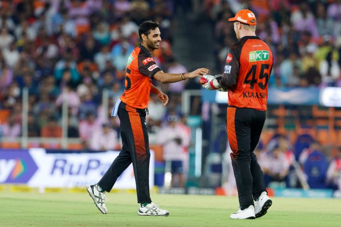 Bhuvneshwar Kumar took three wickets and effected a run-out, giving just two in the final over of the GT innings
