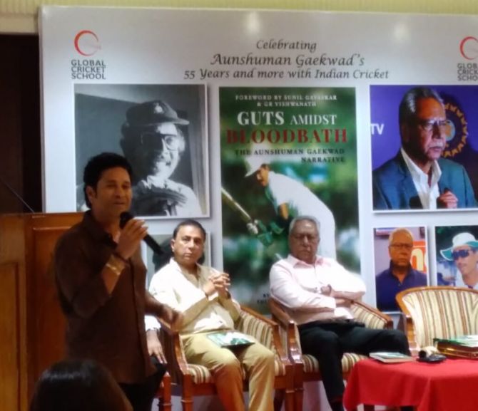 Sunil Gavaskar and Anshuman Gaekwad are all ears as Sachin Tendulkar speaks the the launch of Gaekwad’s biography ‘Guts Amidst Bloodbath’ in Mumbai on Friday. 