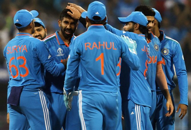 Jasprit Bumrah celebrates with team-mates after taking the wicket of Pathum Nissanka