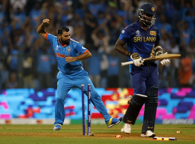 Mohammed Shami celebrates after taking the wicket of Sri Lanka's Angelo Mathews 