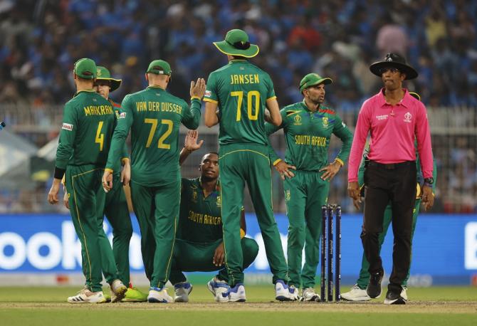 Lungi Ngidi gets a high-five from teammates after having Shreyas Iyer caught by Aiden Markram