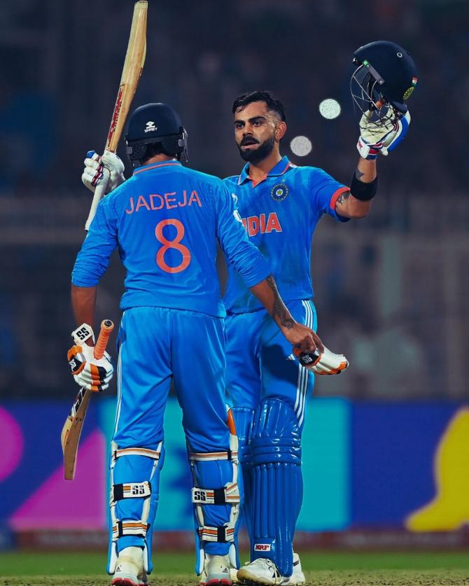 Ravindra Jadeja walks up to congratulate Virat Kohli on his century 