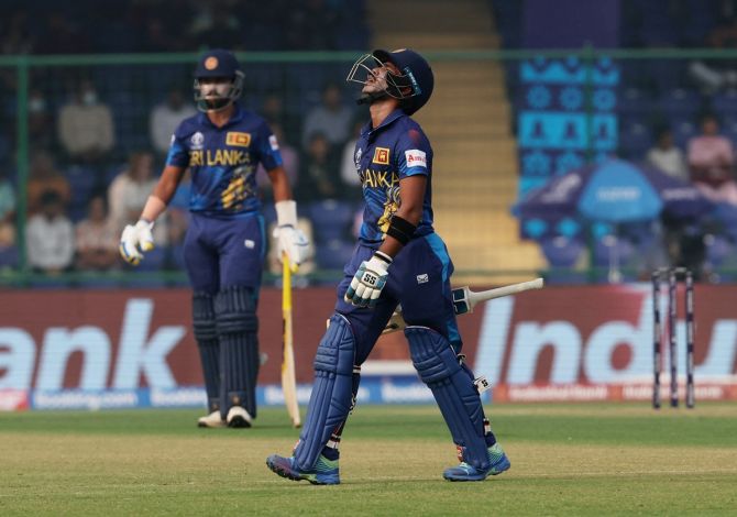 Sri Lanka's Pathum Nissanka walks after losing his wicket, bowled out by Bangladesh's Tanzim Hasan Sakib