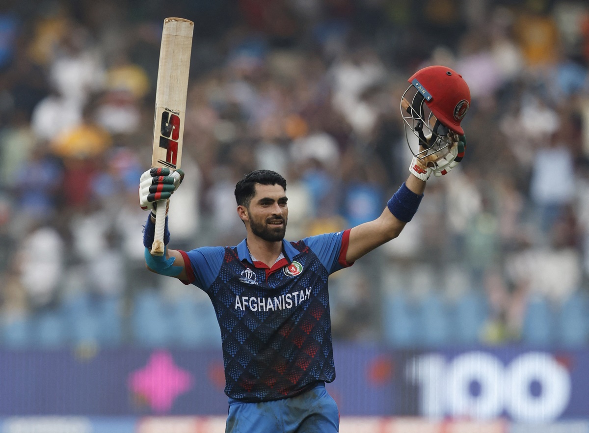 Ibrahim Zadran celebrates after completing his hundred in the ICC World Cup match against Australia in MUmbai on Tuesday.