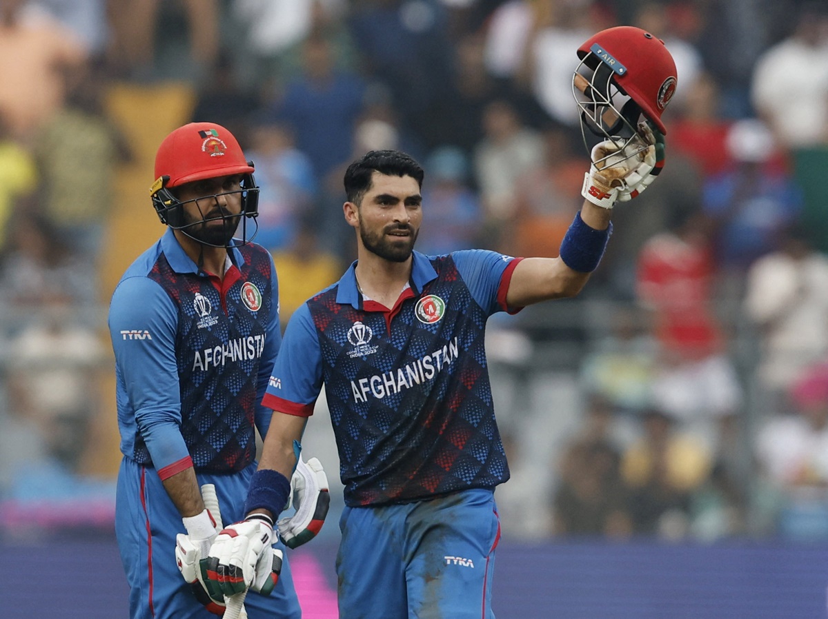 Afghanistan's Ibrahim Zadran celebrates scoring a century against Australia in the ICC World Cup match, at the Wankhede stadium in Mumbai, on Tuesday.