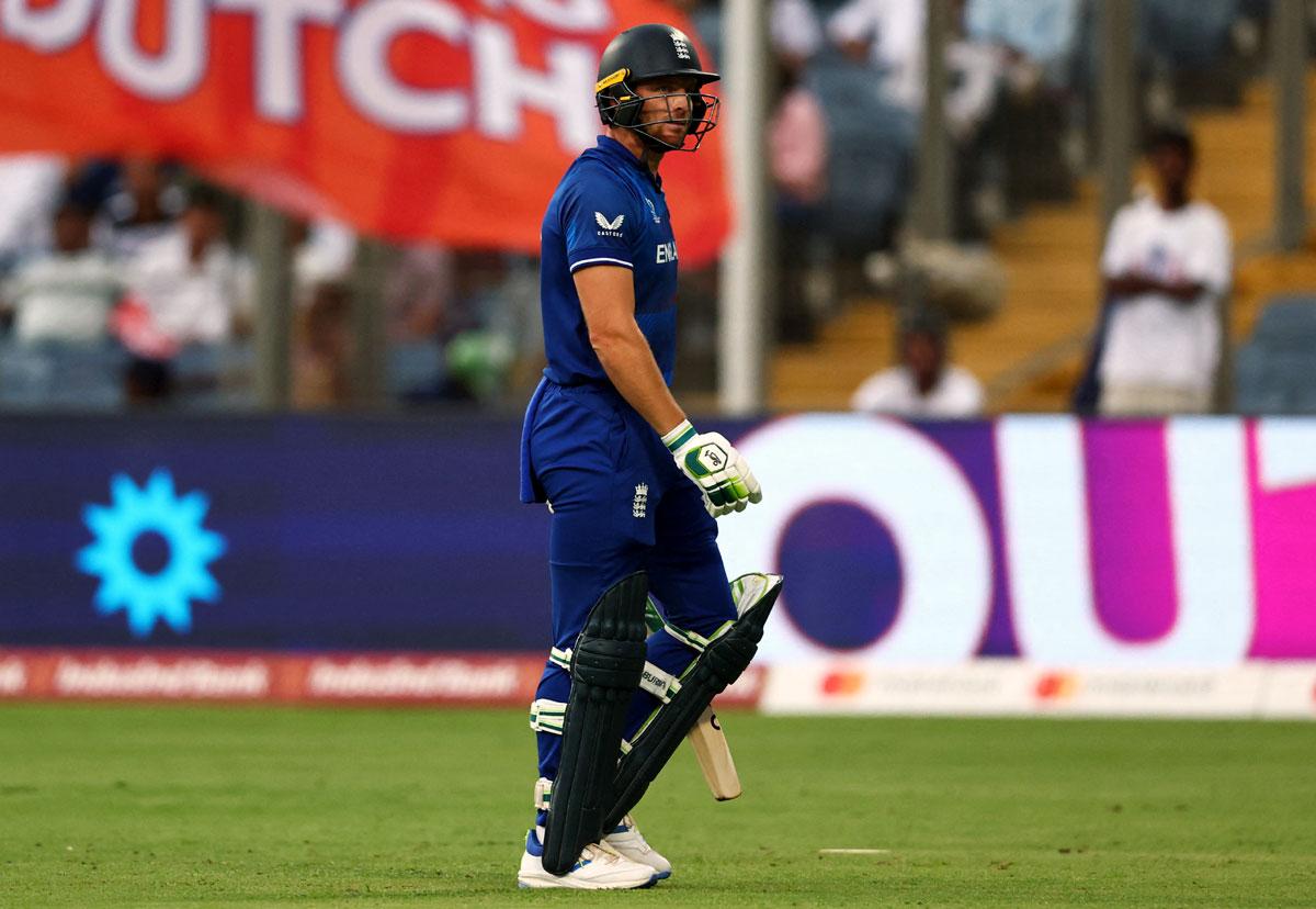 England captain Jos Buttler walks back after his dismissal off the bowling of Paul van Meekeren.