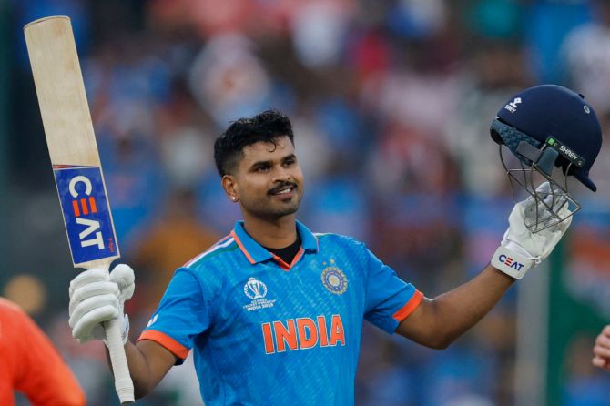 Shreyas Iyer celebrates his century against the Netherlands in the ICC World Cup match, at the M Chinnaswamy stadium in Bengaluru, on Sunday