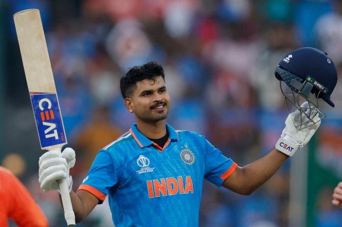 Shreyas Iyer celebrates his century against the Netherlands in the ICC World Cup match, at the M Chinnaswamy stadium in Bengaluru, on Sunday