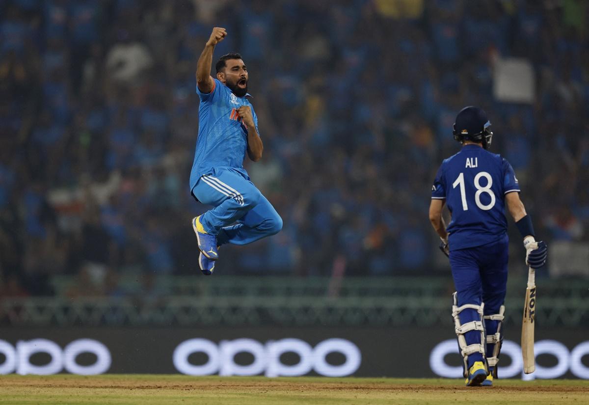 India pacer Mohammed Shami celebrates dismissing England's Moeen Ali, caught by K L Rahul, in the ICC World Cup match in Lucknow, on October 29, 2023.