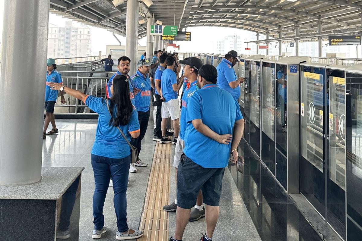 Fans waiting to board the metro 