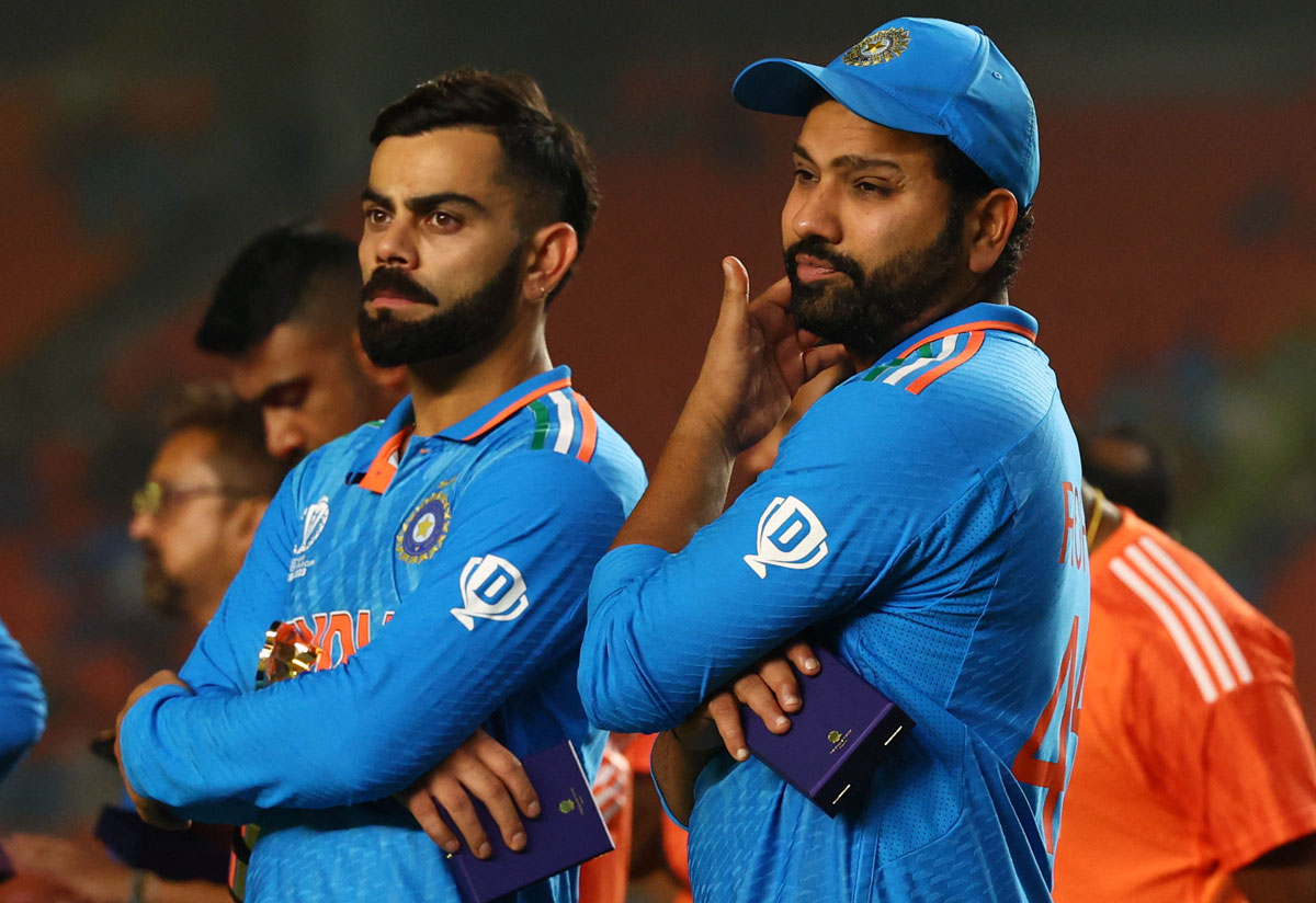 Virat Kohli and Rohit Sharma wear sullen looks after the World Cup final loss on Sunday