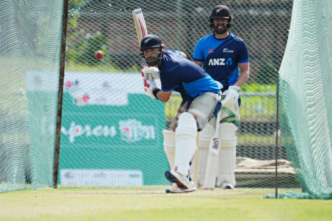  New Zealand's Darryl Mitchell bats in the nets ahead of the first Test against Bangladesh in Sylhet on Tuesday