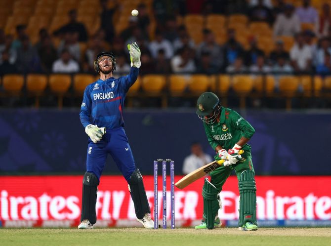 Bangladesh's Tawhid Hridoy is caught out by England's Jos Buttler.