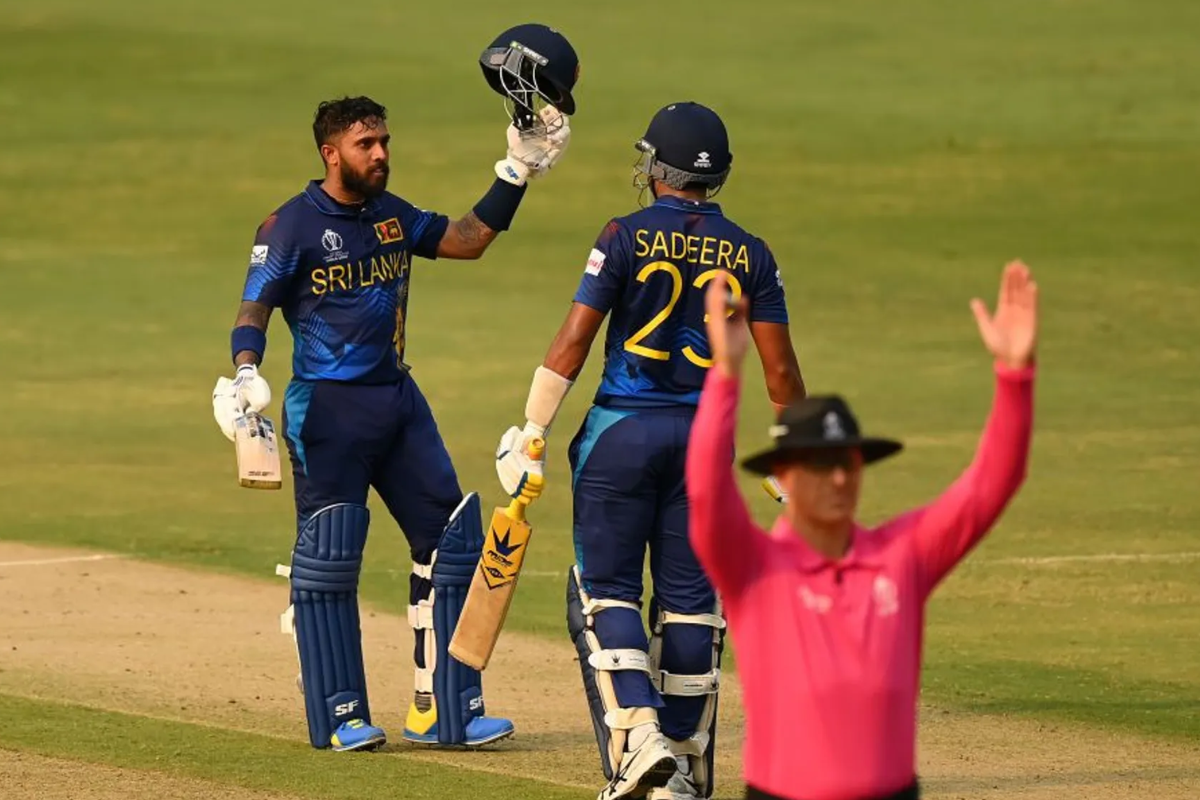 Kusal Mendis celebrates with Sadeera Samarawickrama after completing his hundred