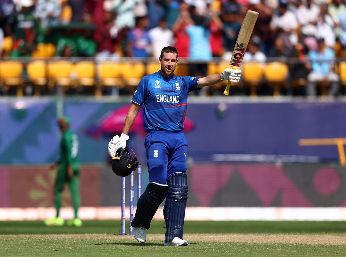 England opener Dawid Malan celebrates completing his century during the match against Bangladesh