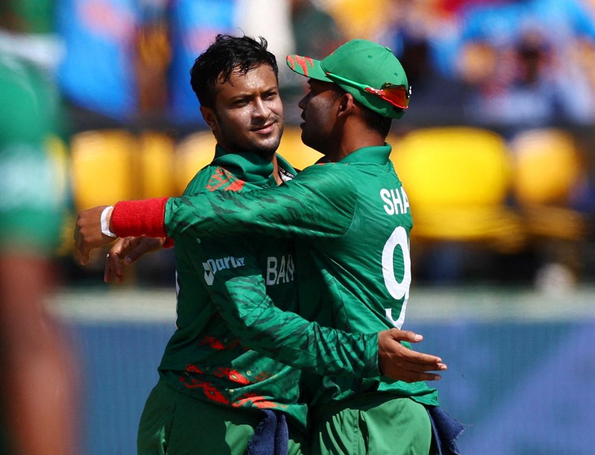 Shakib Al Hasan celebrates with Najmul Hossain Shanto after taking the wicket of England's Jonny Bairstow