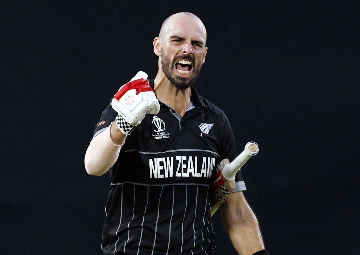 Daryl Mitchell celebrates after completing his maiden World Cup century. He is only the second New Zealand batter to hit a century against India in the ODI World Cup after Glenn Turner in 1975
