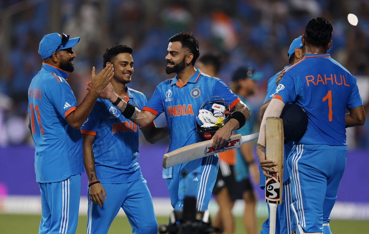 Virat Kohli celebrates with his India teammates after victory over Bangladesh in the ICC World Cup match at Maharashtra Cricket Association Stadium, in Pune.