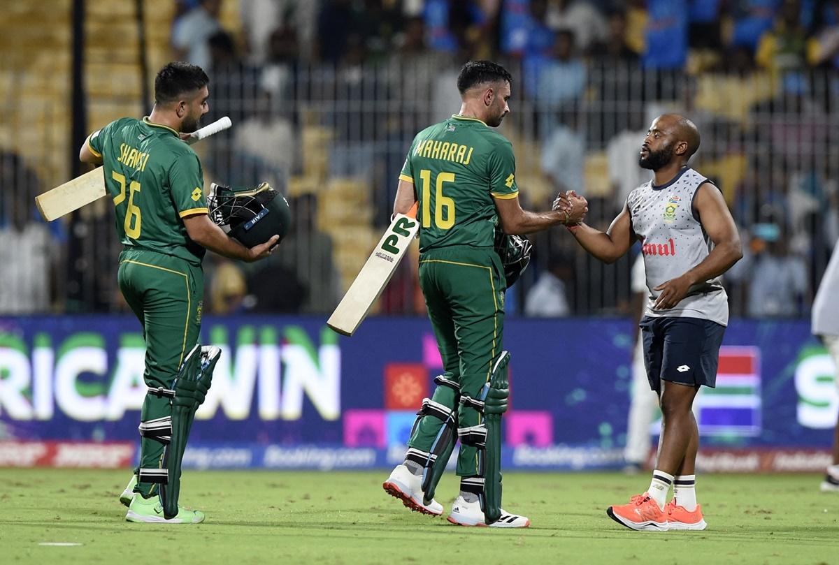 Captain Temba Bavuma congratulates Keshav Maharaj and Tabraiz Shamsi for taking South Africa over the line in the World Cup match against Pakistan in Chennai on Friday.