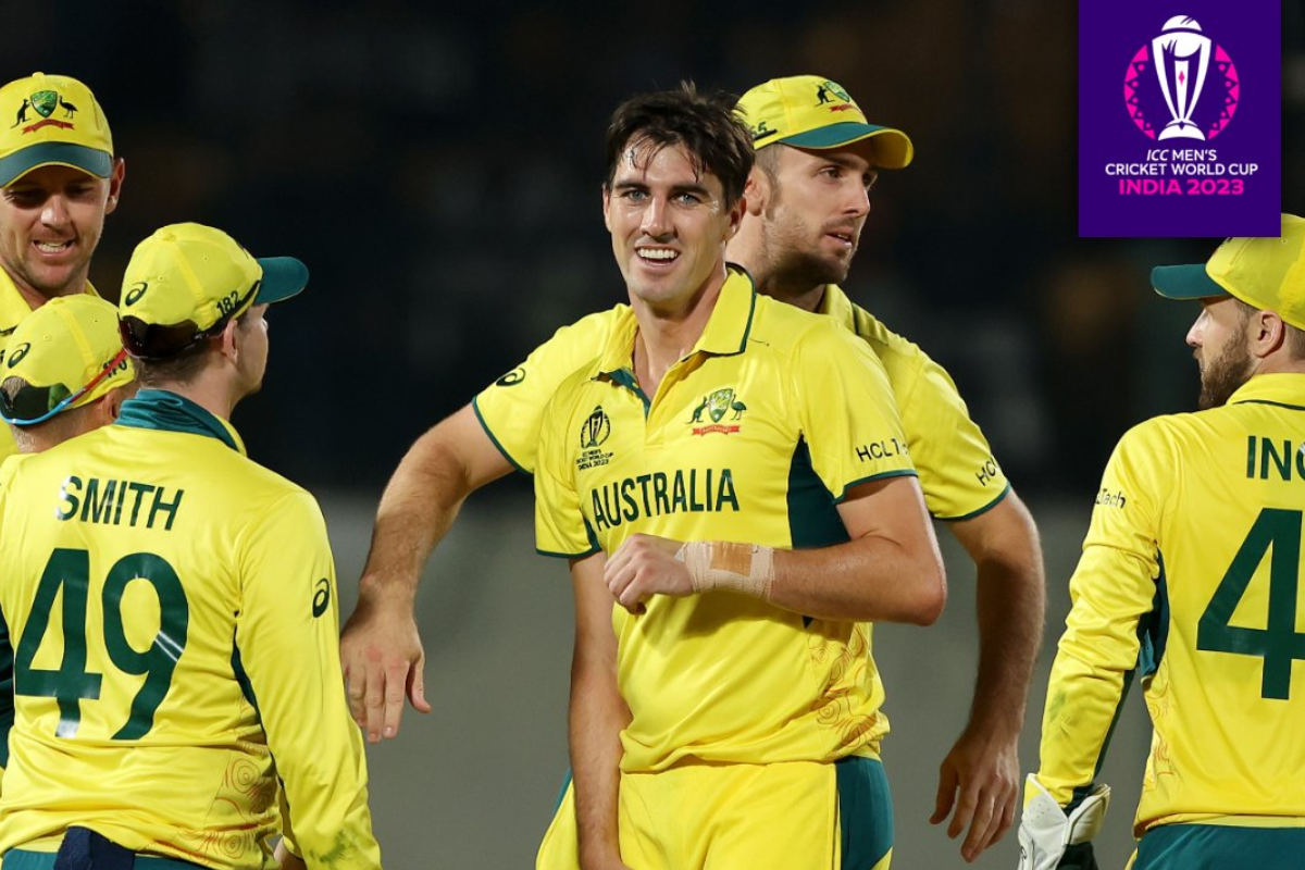 Captain Pat Cummins celebrates with his Australia teammates after a tense victory over New Zealand in the ICC World Cup match in Dharamsala on Sunday.