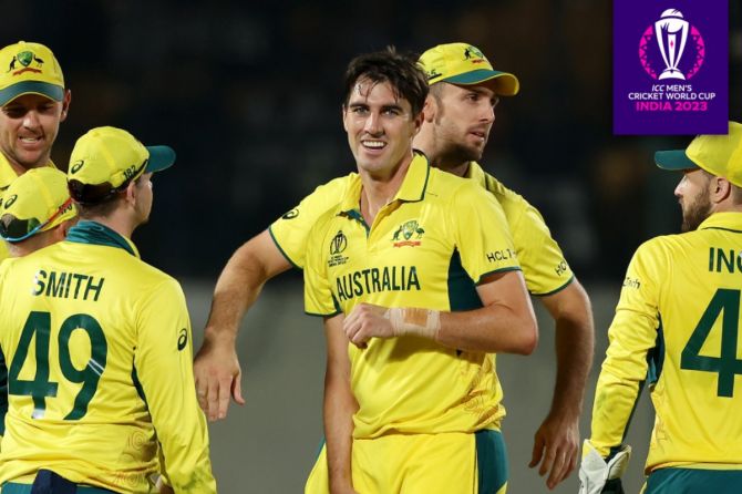 Pat Cummins celebrates with his Australia teammates after the match