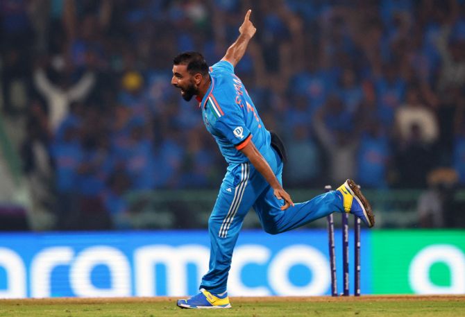 India pacer Mohammed Shami celebrates dismissing England's Jonny Bairstow in the ICC World Cup match in Lucknow on Sunday.