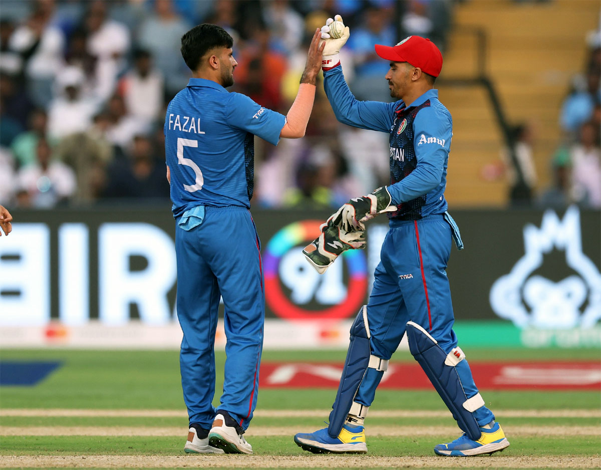 Afghanistan pacer Fazalhaq Farooqi celebrates dismissing Sri Lanka's Angelo Mathews during the ICC World Cup match MCA International Stadium, Pune, on Monday.