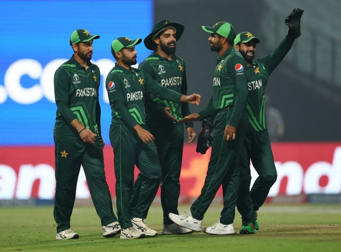 Pakistan players celebrate a wicket