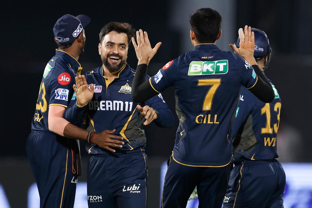 Rashid Khan celebrates the big wicket of Jos Buttler.