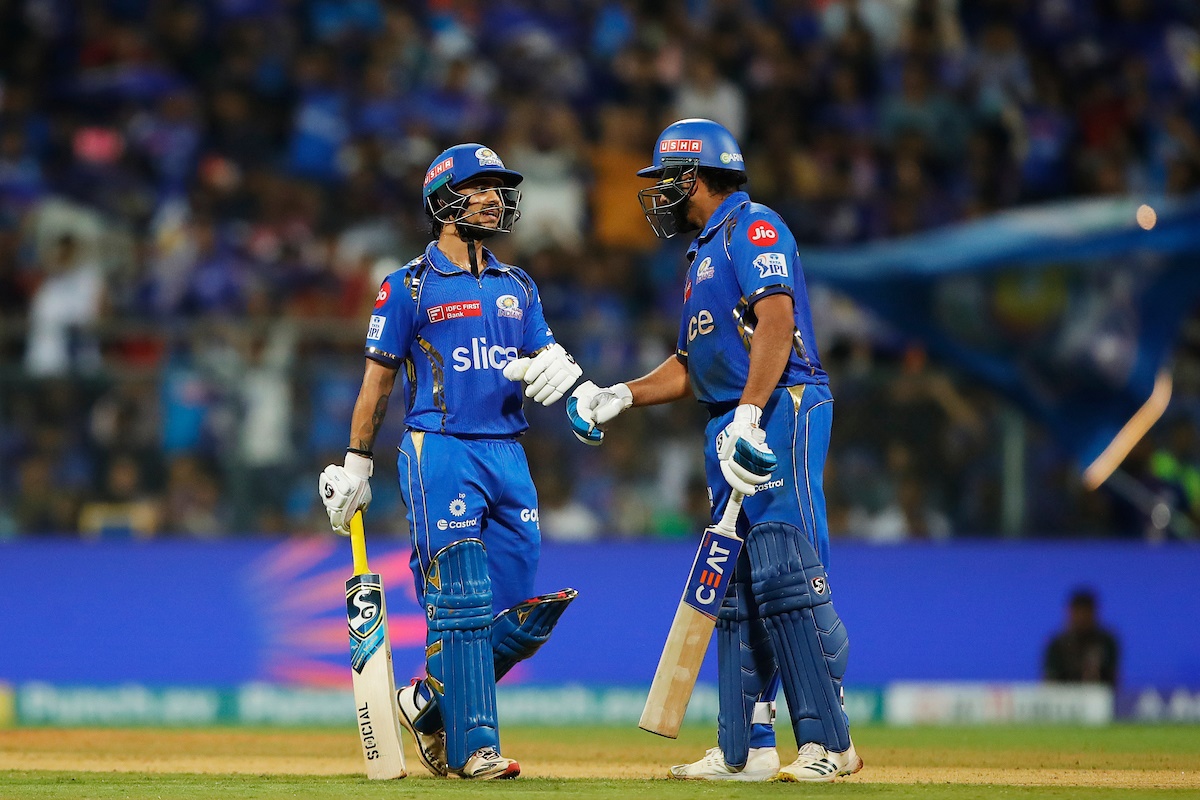 Rohit Sharma and Ishan Kishan celebrate a boundary during their 101 runs opening partnership
