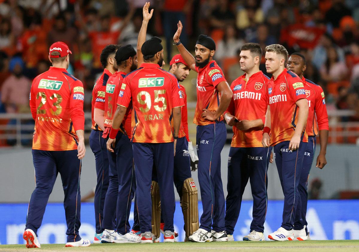 Arshdeep Singh celebrates the wicket of Wriddhiman Saha.