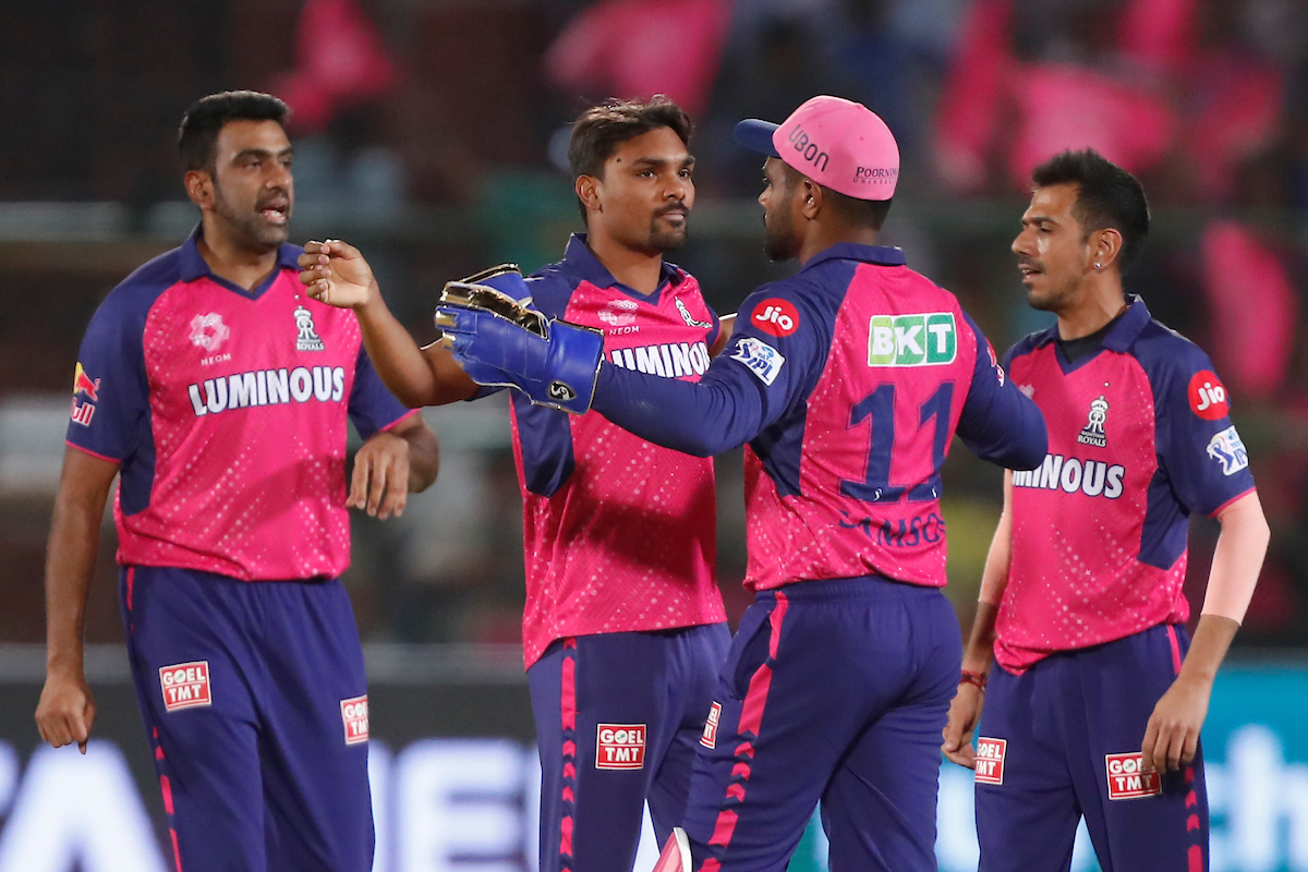 Sandeep Sharma celebrates a wicket with teammates