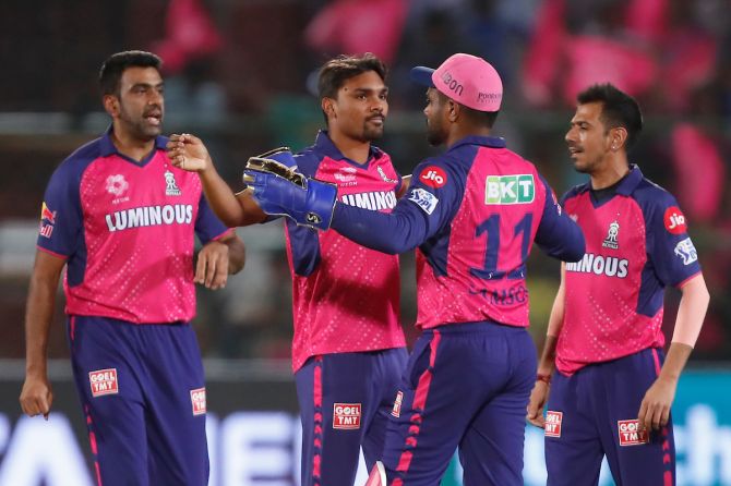 Sandeep Sharma celebrates a wicket with teammates